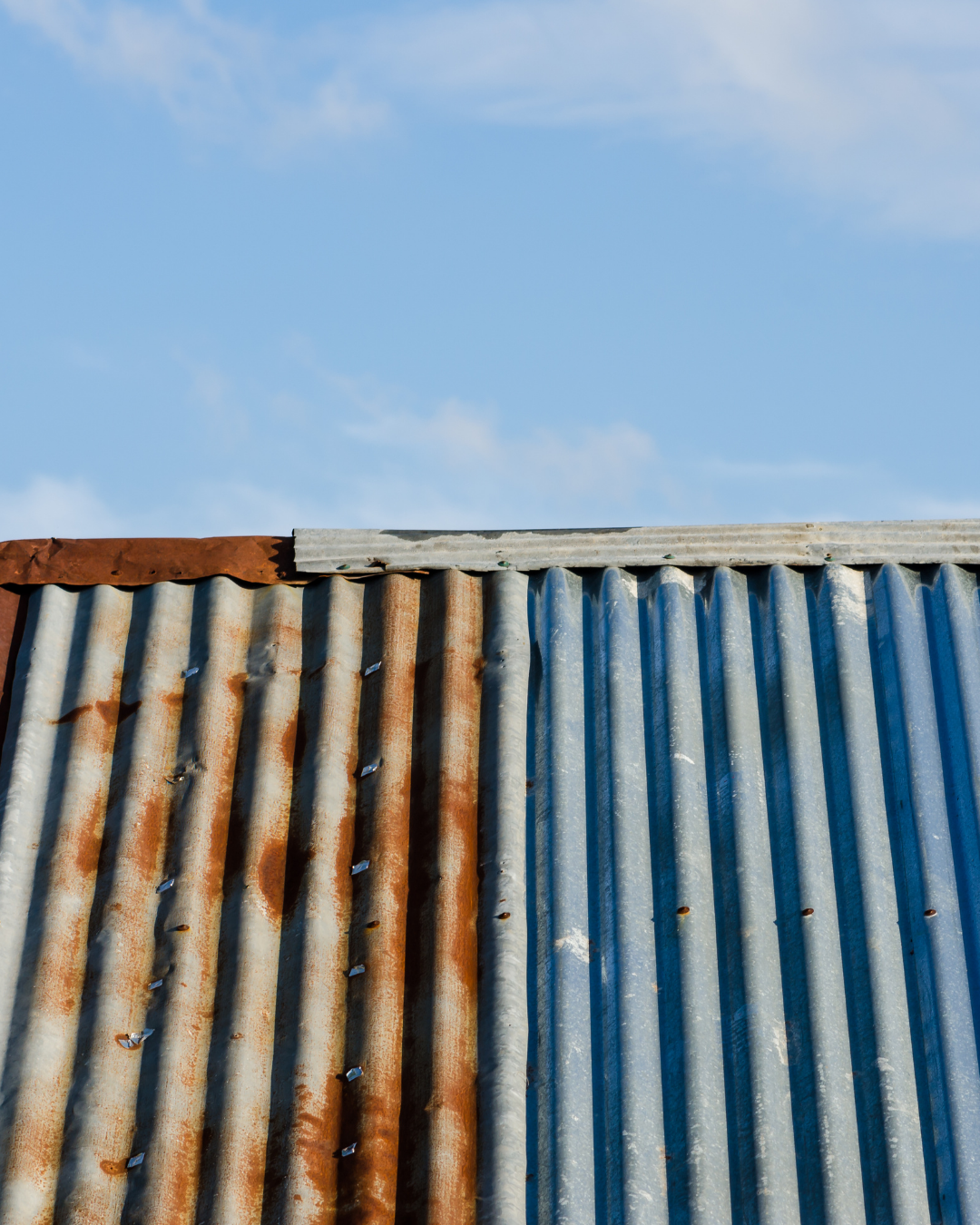 Zinguerie en bac acier nervuré - rénovation façade